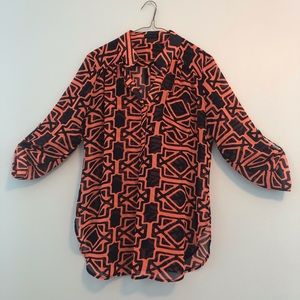 Sheer blouse with adjustable sleeves.